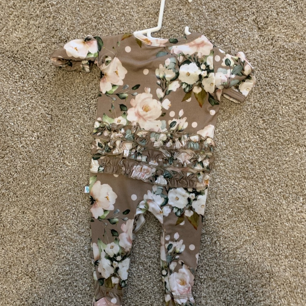 Posh peanut ruffle butt newborn footed onesie